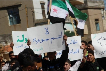  اعتصام بجنيف للمطالبة بإطلاق سراح المعتقلين في سجون المجرم بشار