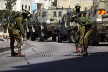  الاحتلال يعتقل عددًا من الفلسطينيين بالقدس والضفة بينهم وزير سابق