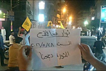  مسيرة ليلية لثوار منيا القمح تطالب بالقصاص لدماء الشهداء